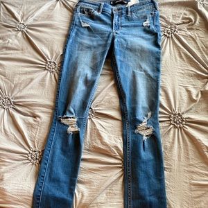 blue distressed jeans